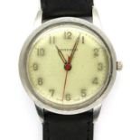 GARRARD: gents steel cased manual wind wristwatch, with circular silvered dial on a black leather