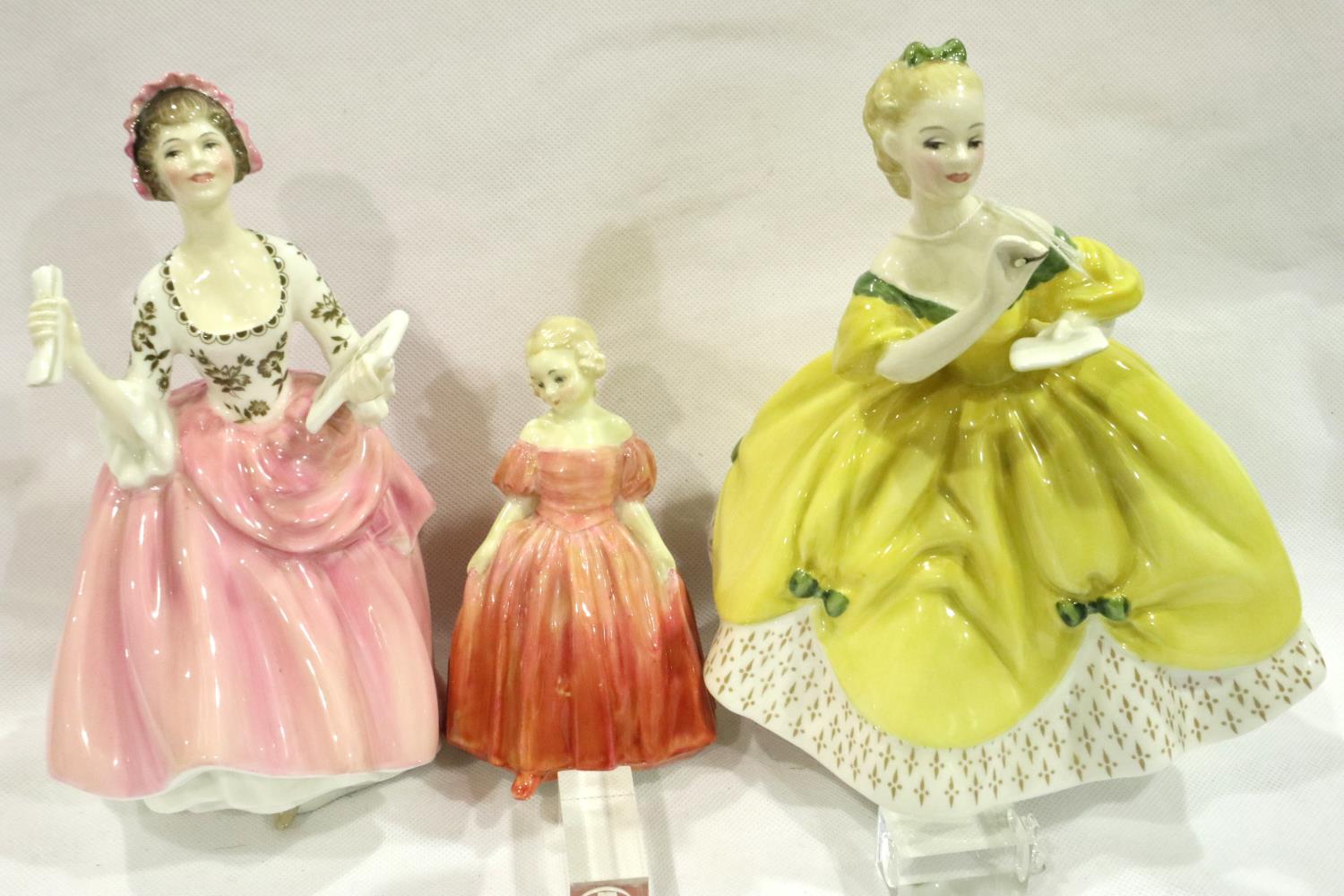 Three Royal Doulton figurines including Ballad Seller HN 2266, H: 19 cm, no cracks or chips. P&P