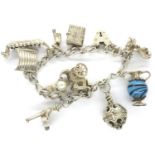 925 silver charm bracelet with hallmarked silver padlock clasp, safety chain and ten charms, L: 18