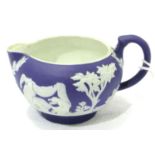 Miniature Wedgwood Jasperware jug, H: 20 mm, dark blue background with applied white figures. P&P