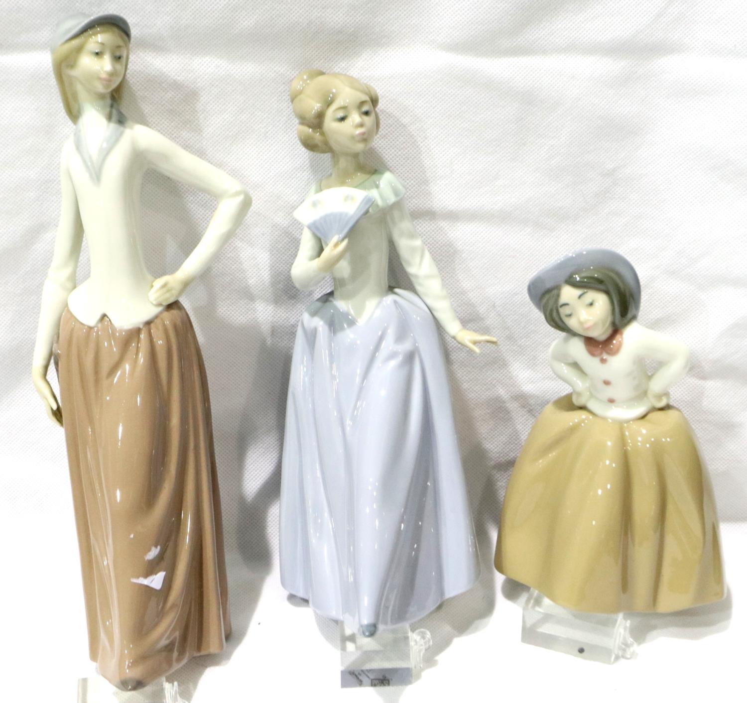 Three Nao figurines, largest H: 28 cm, no cracks or chips. P&P Group 2 (£18+VAT for the first lot