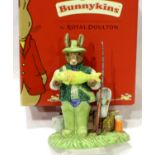 Royal Doulton Bunnykins figurine, Caught A Whopper, H: 12 cm, boxed. No cracks, chips or visible
