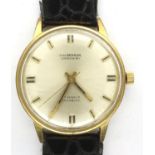 JW BENSON: 25 jewel gents manual wind wristwatch, with circular champagne dial and Incabloc movement