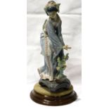 Lladro Oriental lady on wooden stand, H: 24 cm, no cracks or chips. No visible restoration or