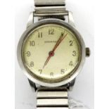GARRARD: gents manual wind wristwatch, with circular champagne dial, expanding steel bracelet and