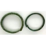 Two Celtic ringlets in bronze, largest L: 30 mm. P&P Group 0 (£5+VAT for the first lot and £1+VAT
