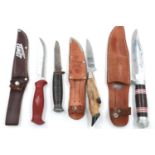 Three sheathed hunting knives and a further William Rodgers example (4). P&P Group 2 (£18+VAT for