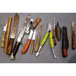 Fourteen various knives including sheathed examples. P&P Group 3 (£25+VAT for the first lot and £5+