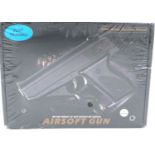 New old stock airsoft pistol, model V7, silver grey, boxed and unopened. P&P Group 2 (£18+VAT for