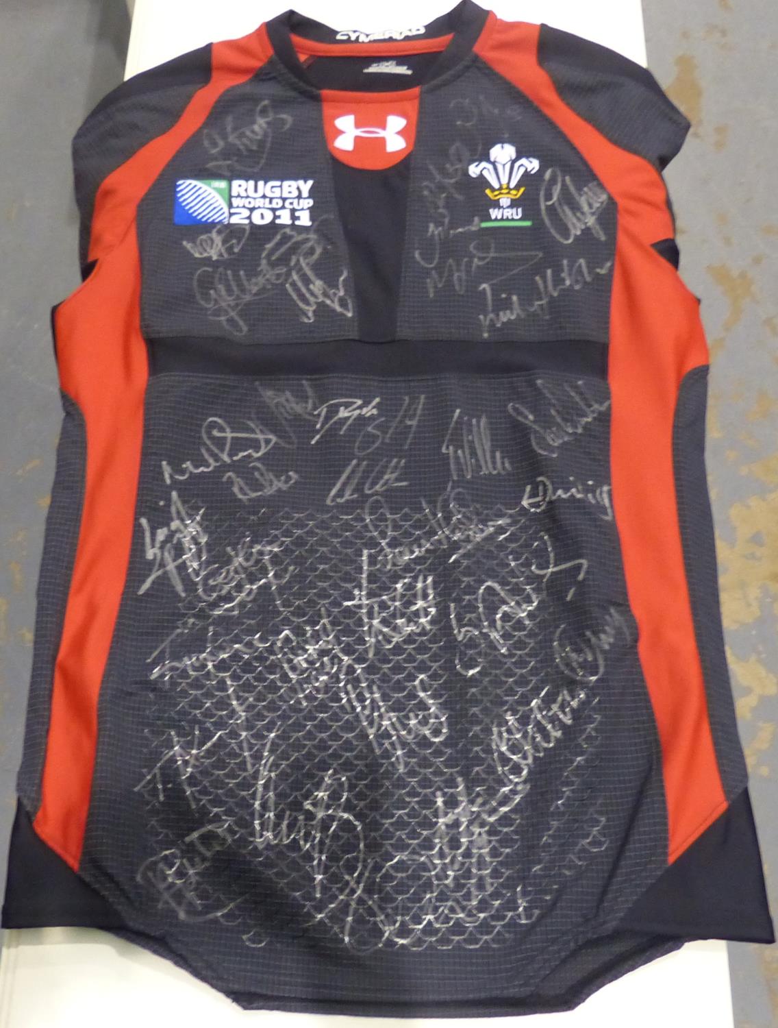 Welsh rugby union signed 2011 world cup shirt. P&P Group 1 (£14+VAT for the first lot and £1+VAT for