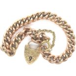 9ct gold link bracelet with a heart form padlock clasp, L: 20 cm, 16.6g. P&P Group 1 (£14+VAT for