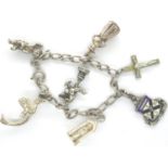 925 silver bracelet with seven charms, L: 18 cm. P&P Group 1 (£14+VAT for the first lot and £1+VAT