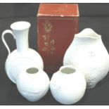 Three AK Kaiser vases and a Hutschenreuther example, all with relief decoration, one boxed, no