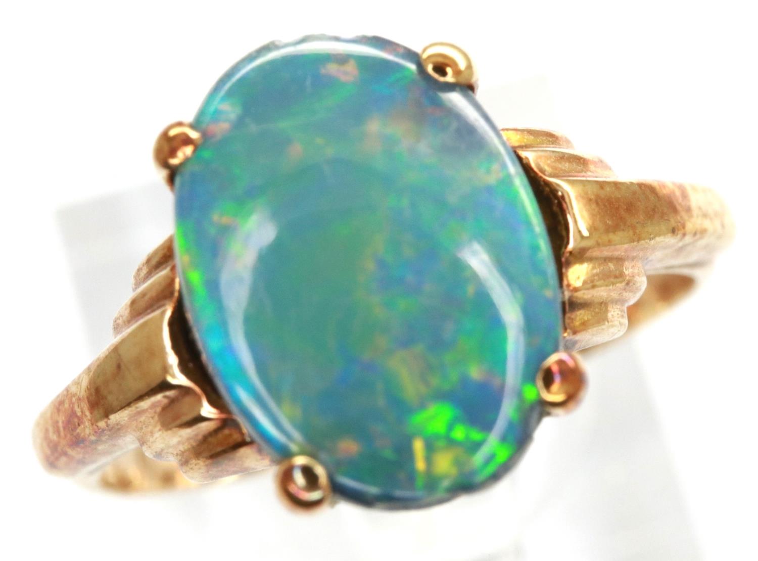 9ct gold ring set with an opal, size M, 1.9g. P&P Group 1 (£14+VAT for the first lot and £1+VAT