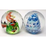 Two Murano glass paperweights with fish design, largest H: 80 mm, in good condition. P&P Group 2 (£
