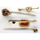 9ct gold hat and tie pins, some set with aquamarine, combined 8.1g. P&P Group 1 (£14+VAT for the