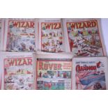 Approximately 100 comics, circa 1940-1950s, mainly Wizard, mainly in good condition. P&P Group 2 (£