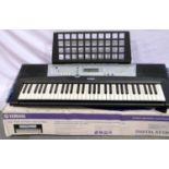 Yamaha 498 digital keyboard, boxed. P&P Group 3 (£25+VAT for the first lot and £5+VAT for subsequent
