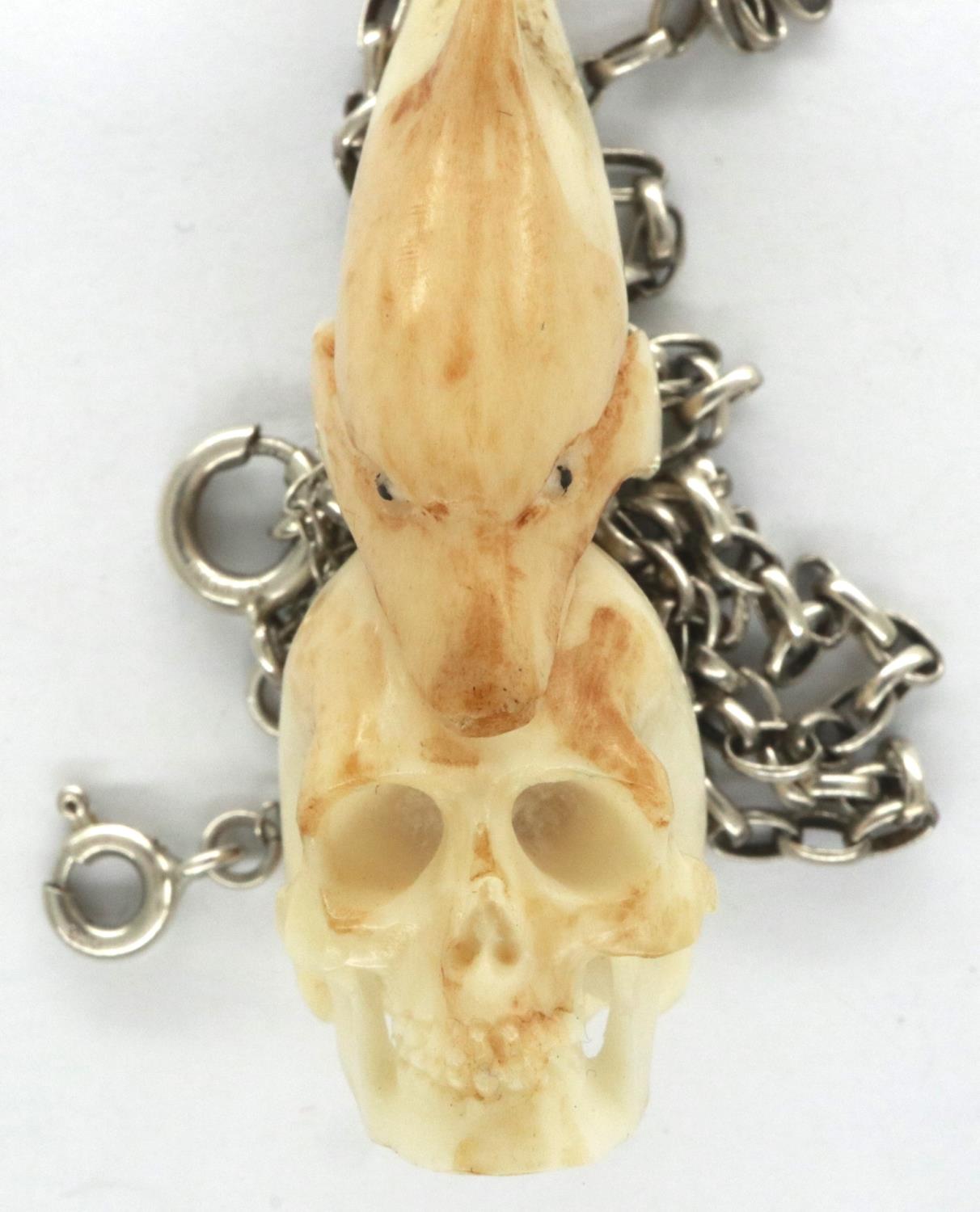 Meerschaum skull and dolphin form pendant, on a 925 silver neck chain, L: 50 cm. P&P Group 1 (£14+ - Image 3 of 4