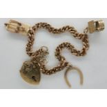 9ct gold flatlink gold charm bracelet with three charms and padlock clasp, L: 18 cm, 17.8g. P&P