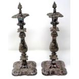 Pair of silver plated candlesticks with filigree decoration and flame form toppers, H: 38 cm. P&P