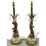 Pair of brass and crystal figural lamps featuring cherubs, H: 60 cm, no visible damages/restoration,