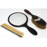 Silver and ebony mirror brush and comb set. P&P Group 1 (£14+VAT for the first lot and £1+VAT for