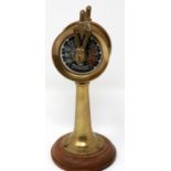 A miniature brass engine room telegraph raised on a turned wood plinth, H: 15 cm. P&P Group 1 (£14+