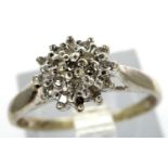 9ct white gold diamond cluster ring, size K, 1.5g. P&P Group 1 (£14+VAT for the first lot and £1+VAT