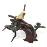 Cold painted bronze bird on tree stump base, L: 39 cm. P&P Group 3 (£25+VAT for the first lot and £