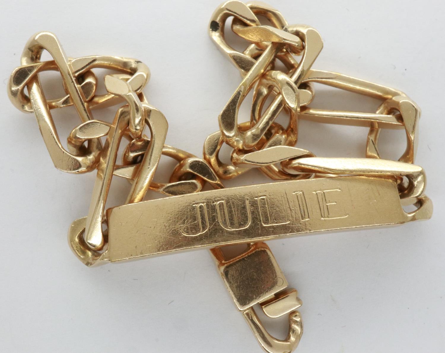 Presumed 9ct gold identity bracelet, inscribed Julie, L: 21 cm, 16.1g. P&P Group 1 (£14+VAT for