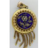 Victorian 18ct gold forget-me-not pendant, circular, enamelled in blue and set with old-cut