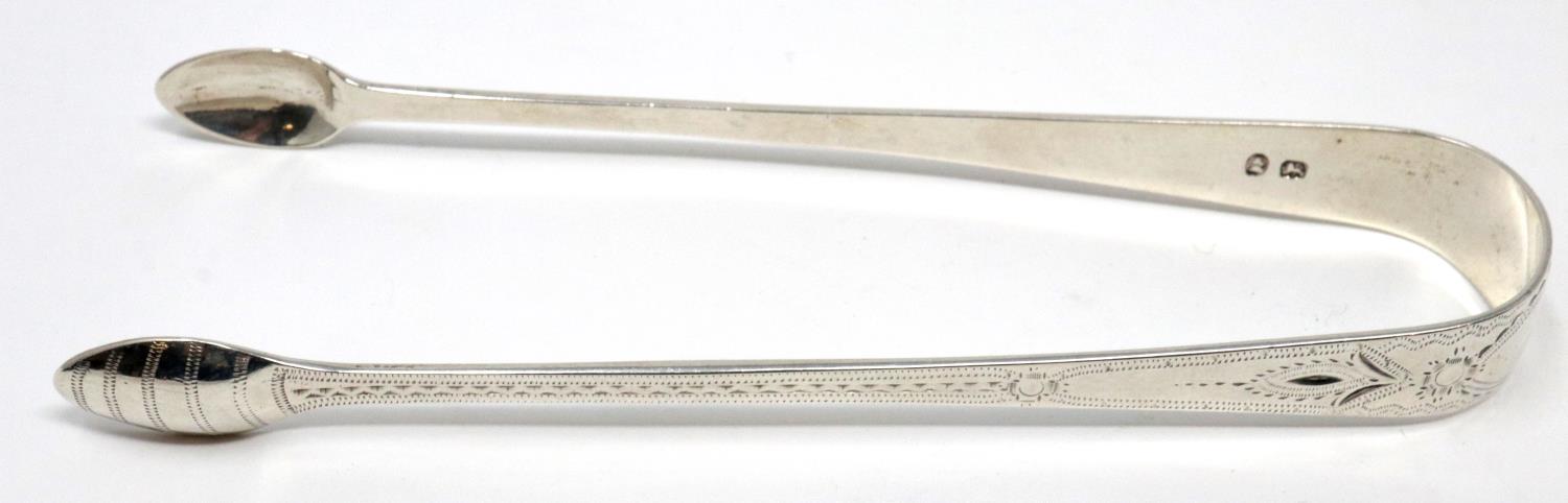 Pair of Georgian hallmarked silver sugar tongs, 29g. P&P Group 1 (£14+VAT for the first lot and £1+