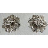 Pair of 18ct white gold diamond set flower stud earrings, 2.9g. P&P Group 1 (£14+VAT for the first