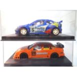 Two Ninco slot cars; Alfa Romeo and Renault both in very good to excellent condition, plastic boxes.
