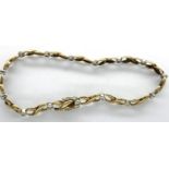 9ct gold diamond bracelet set with fifteen diamonds, L: 16 cm, 6.1g. P&P Group 1 (£14+VAT for the