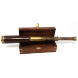 Three draw brass and wood telescope, extended L: 45 cm. P&P Group 2 (£18+VAT for the first lot