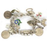 Hallmarked silver charm bracelet with twelve charms, and hallmarked silver clasp, L: 18 cm, combined