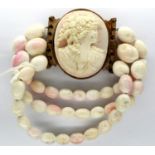 Victorian cameo and coral three strand bracelet, approximate D: 12 cm. P&P Group 1 (£14+VAT for