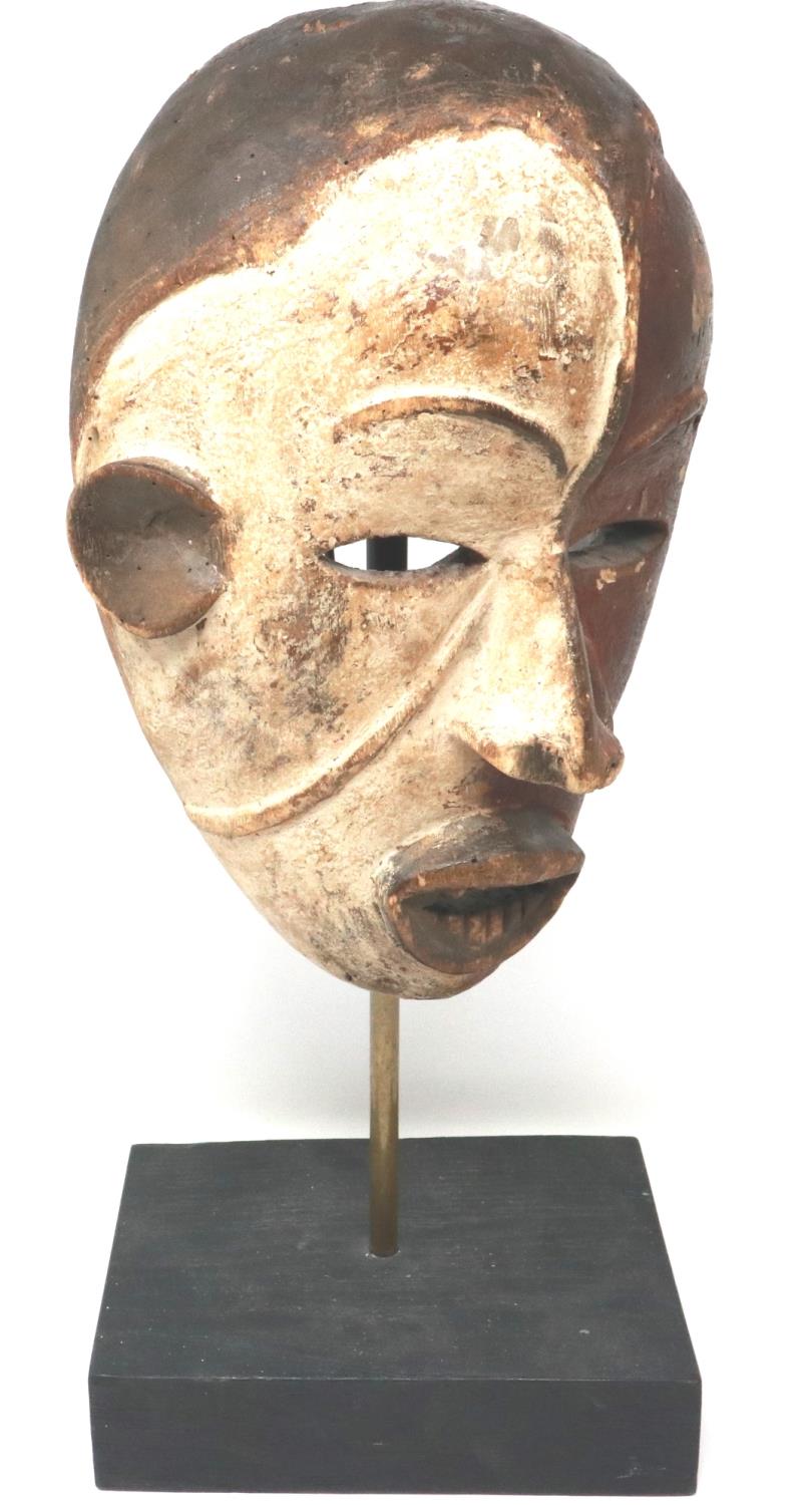 Carved wooden Tribal mask on a wooden stand, overall H: 47 cm. P&P Group 3 (£25+VAT for the first - Image 2 of 3