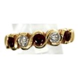 9ct gold channel set diamond and ruby ring, size O, 3.9g. P&P Group 1 (£14+VAT for the first lot and