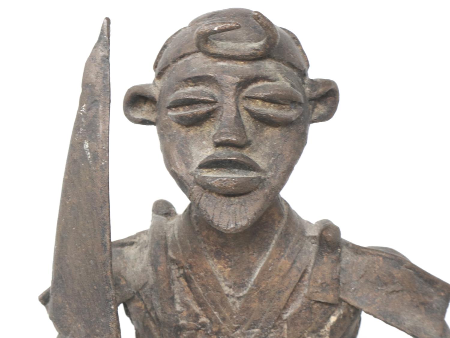 Bronze Tribal warrior statue with sword and spear, H: 43 cm. P&P Group 3 (£25+VAT for the first - Image 2 of 3