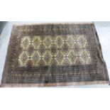 A 20th century Middle Eastern floor rug, with Geometric designs, 187 x 133 cm. Not available for