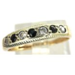 9ct gold channel set ring with sapphires and cubic zirconia, size K, 1.4g. P&P Group 1 (£14+VAT