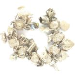 925 silver/white metal charm bracelet with eighteen charms, some hallmarked silver, chain L: 16