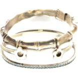 Three silver bangles, one hallmarked silver, largest D: 70 mm, 36g. P&P Group 1 (£14+VAT for the