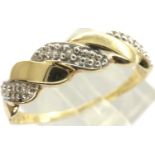 9ct gold crossover ring set with diamonds, size T, 1.8g. P&P Group 1 (£14+VAT for the first lot