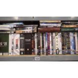 Shelf of mixed DVDs including box sets. Not available for in-house P&P