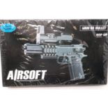 New old stock airsoft pistol, model 2123A, factory sealed. P&P Group 1 (£14+VAT for the first lot