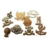 Ten brass British Army Yeomanry cap badges. P&P Group 1 (£14+VAT for the first lot and £1+VAT for